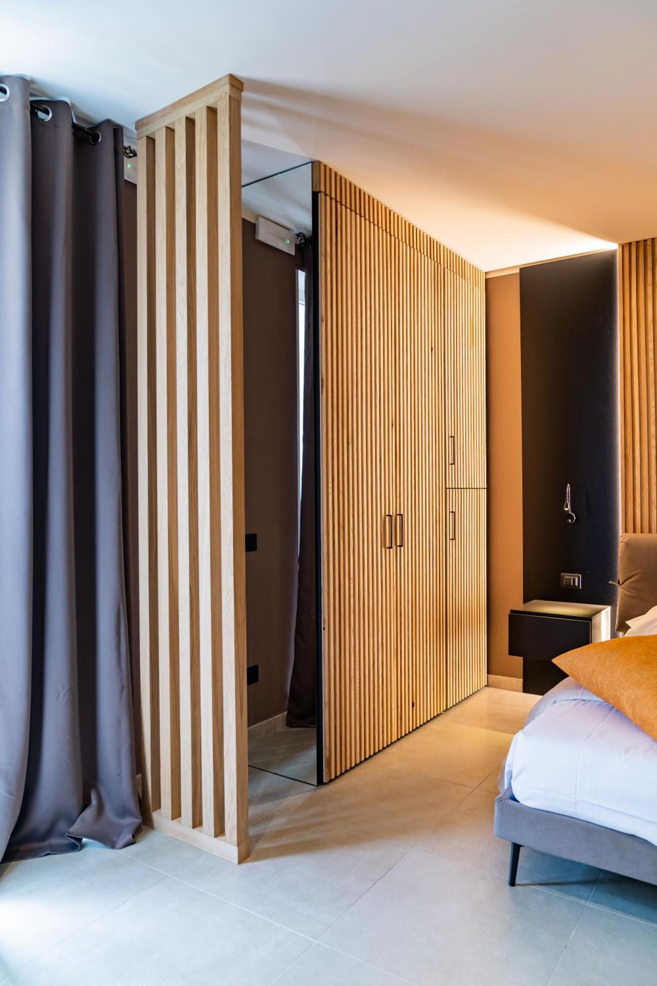 La Pergola Suites Дособуоно Екстериор снимка