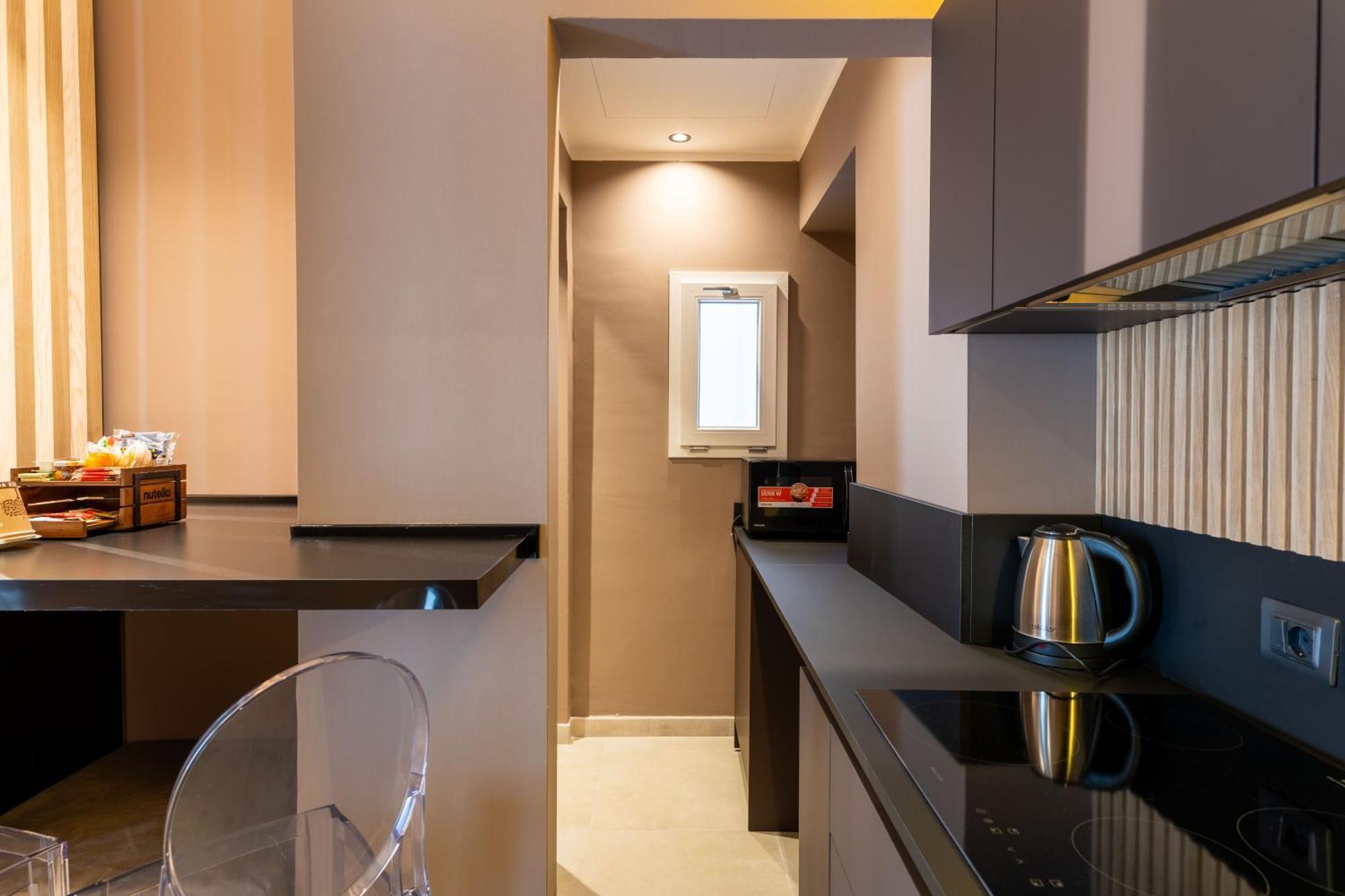 La Pergola Suites Дособуоно Екстериор снимка